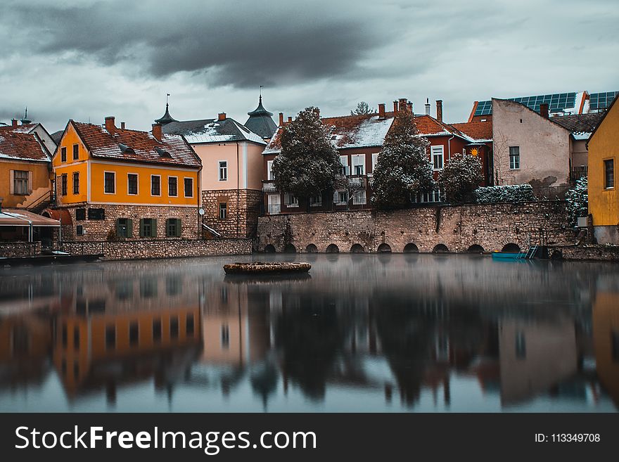 Bodies Of Water Near Houses Photography