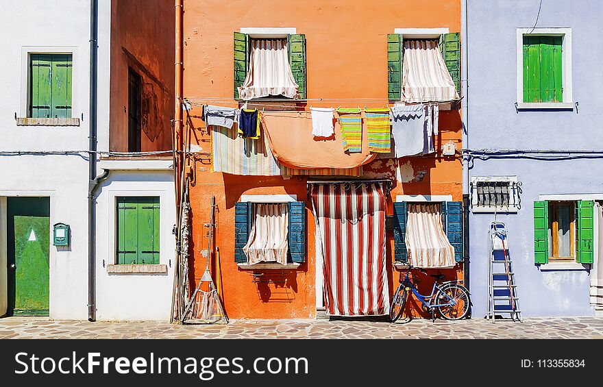 picturesque facades of houses in the island of Burano, Venice.