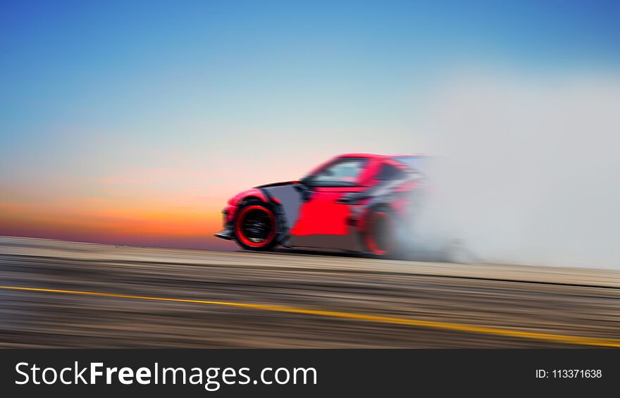 Abstract blurred car wheel drifting and smoking on track. Sport
