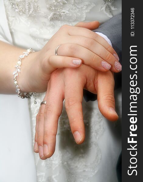 Hands with wedding rings, marriage, symbol,