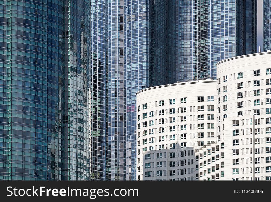 Modern urban architecture. Abstract background photo, block of flats walls with reflections