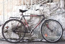 The Old Bicycle Stands Near The Building Royalty Free Stock Photo The Old Bicycle Stands Near The Building Royalty Free Stock Photo