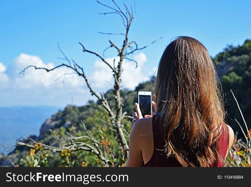 Photo of Woman Taking Photo