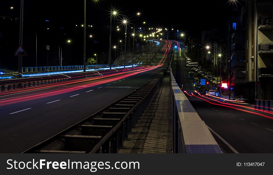 Time Lapse Photo of Road With Cars Passing
