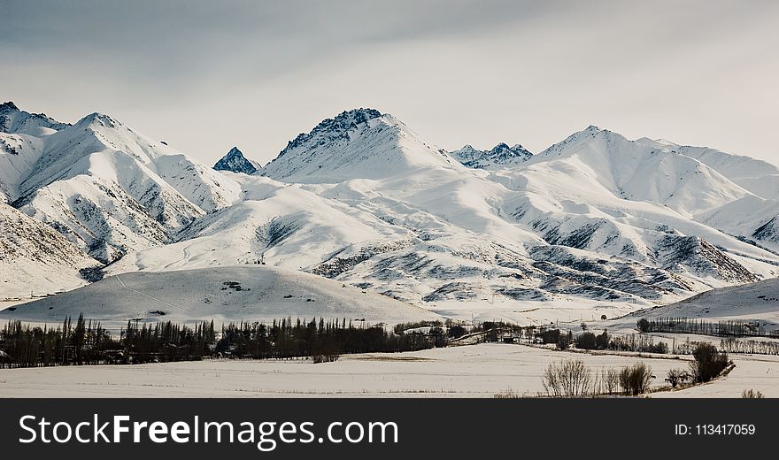 Scenic View Of The Mountains During Winter