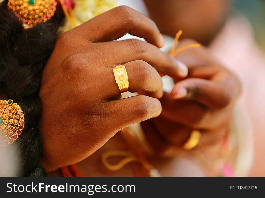 Hindu Indian wedding ceremony, closeup hand