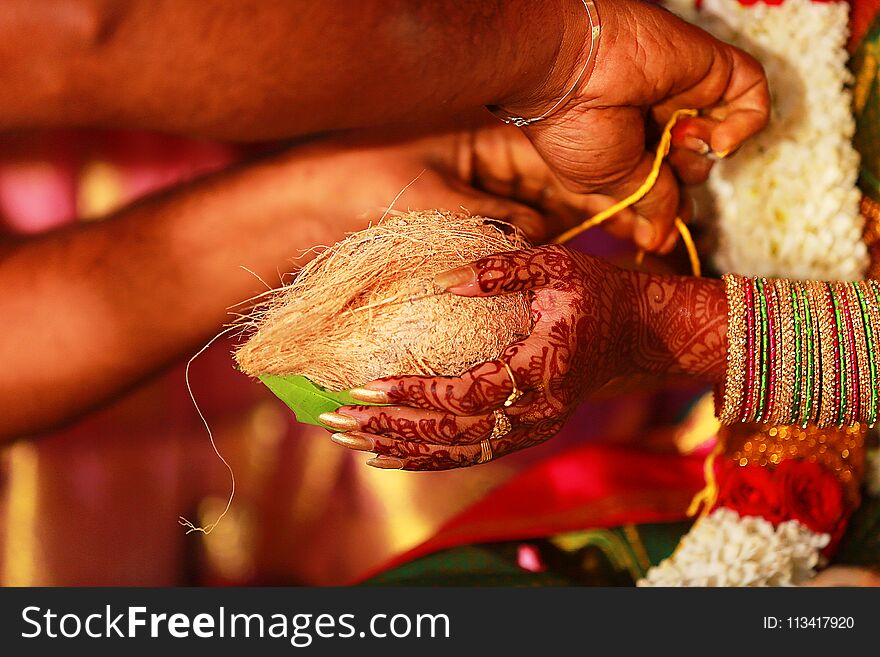 Closeup hand South Indian wedding rituals, ceremony