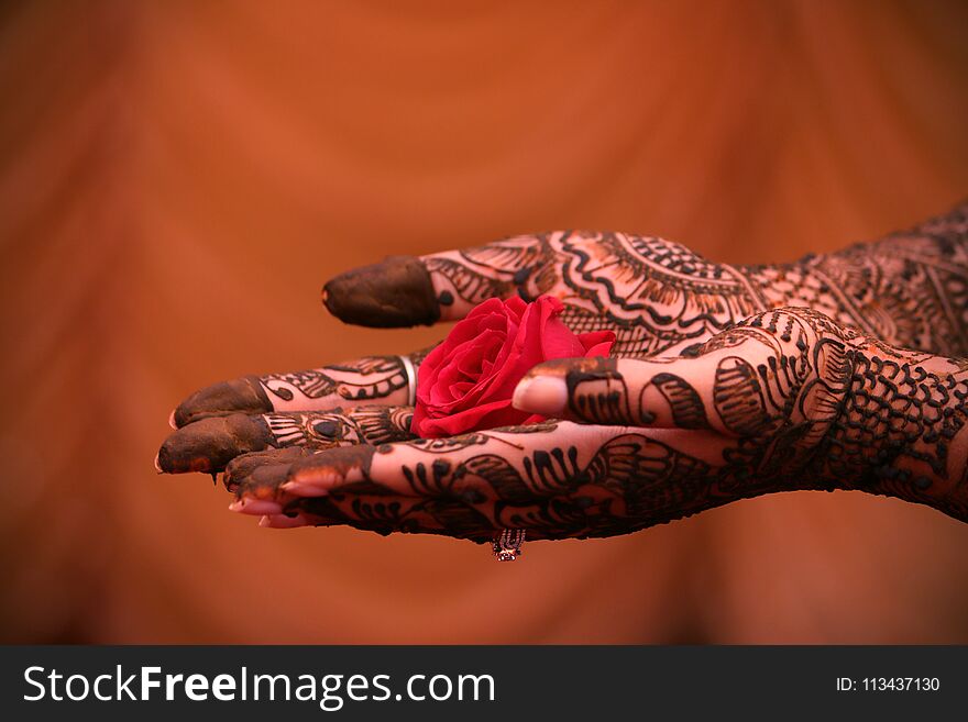 Mehndi is the ritual before wedding when the brides hand is covered with mehndihenna. It is believed that the color of the henna indicates the love between the 2 individuals. This picture was taken during one of my friends wedding. Mehndi is the ritual before wedding when the brides hand is covered with mehndihenna. It is believed that the color of the henna indicates the love between the 2 individuals. This picture was taken during one of my friends wedding.
