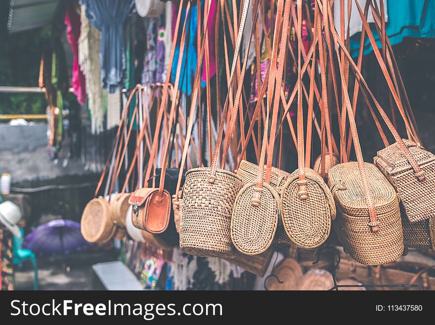 Rattan Handbags Hanging In The Outdoor Local Asian Store. Bali Island.