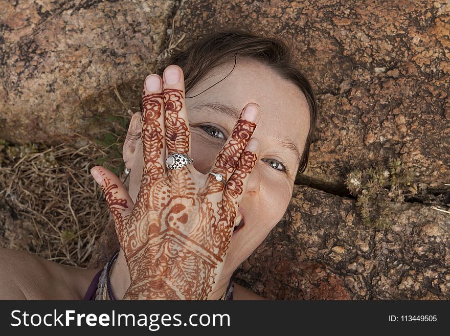 Girl Taking Selfie Laying On The Ground