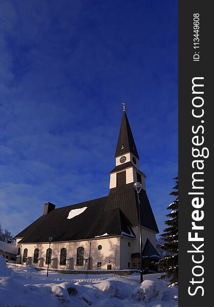 An old church in Rovaniemi and beautiful northern blue sky. An old church in Rovaniemi and beautiful northern blue sky