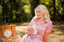Beautiful And Young Blonde Woman On Picnic Royalty Free Stock Images