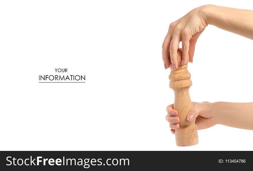 Pepper mill wooden in hand pattern on white background isolation