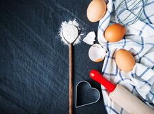 Baking Ingredients On A Black Stock Photography