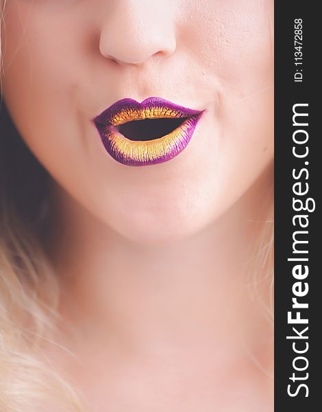 Woman With Purple And Yellow Lipstick