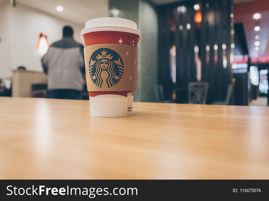 Photo Of Paper Cup On Top Of The Table