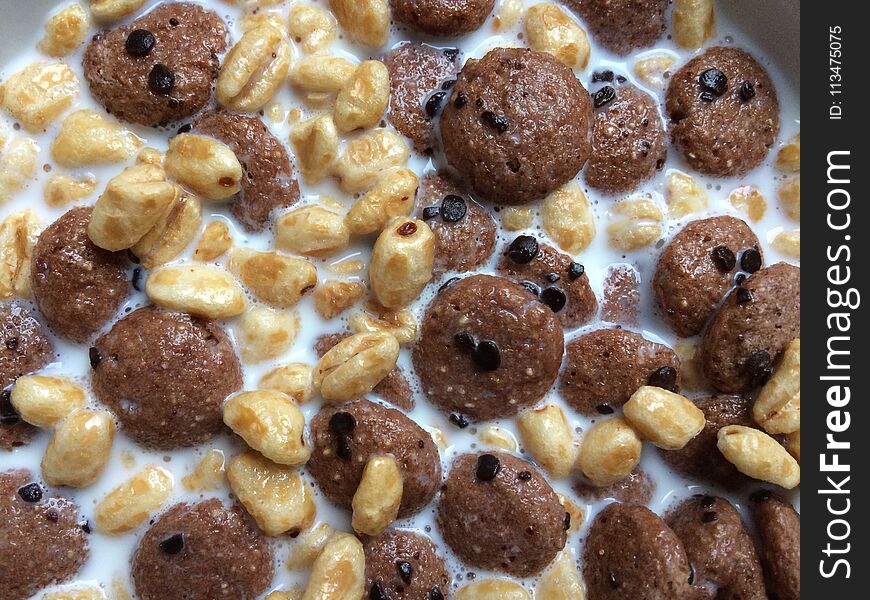 Milk and cereals in a bowl. Milk and cereals in a bowl