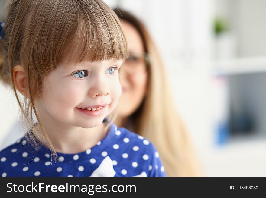 Little child with mother at pediatrician reception. Physical exam cute infant portrait baby aid healthy lifestyle ward round child sickness clinic test high quality and baby concept