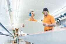 Carpenter In Furniture Factory Inspecting Piece In QA Stock Images Carpenter In Furniture Factory Inspecting Piece In QA Stock Images