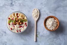 Diet Breakfast Oatmeal With Fruits, Bowl And Spoon With Oat Flakes, Selective Focus, Close-up Stock Photography