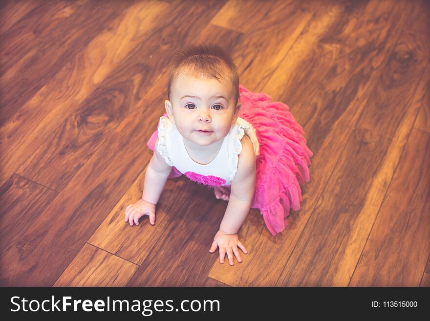 Baby smiling and looking up