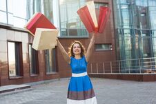 Happiness, Consumerism, Sale And People Concept - Woman With Shopping Bags Stock Photography