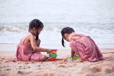 Two Cute Asian Little Child Girls Having Fun To Play With Sand Stock Images Two Cute Asian Little Child Girls Having Fun To Play With Sand Stock Images