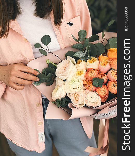 Person Holding Bouquet of Flower