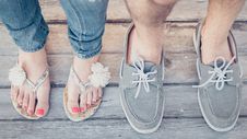 Free Closeup Photo Of Person Wearing Gray Boat Shoes And Gray Flip-flops Royalty Free Stock Image - 113641906
