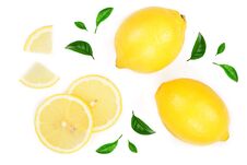 Lemon And Slices With Leaf Isolated On White Background. Flat Lay, Top View Royalty Free Stock Image