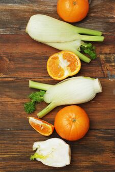 Fennel Vegetable Isolated. Fennel And Orange Citrus Fruit Over Wooden Background. Healthy Vegetarian Food. Royalty Free Stock Image
