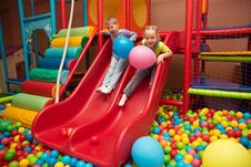 Kids Playing In A Pool Of Balls Royalty Free Stock Photography