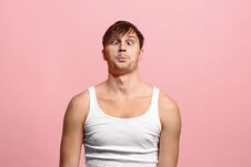 The Squint Eyed Man With Weird Expression On Pink Stock Photos