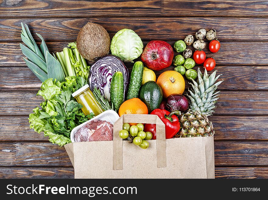 Natural Healthy Food in a paper bag. A set of natural products in the craft shop. Natural Healthy Food in a paper bag. A set of natural products in the craft shop.