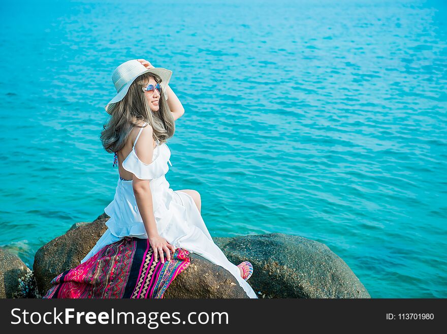 Women travel alone at the sea and beach on Summer. Vacation and relaxing, Chonburi Thailand. Women travel alone at the sea and beach on Summer. Vacation and relaxing, Chonburi Thailand.