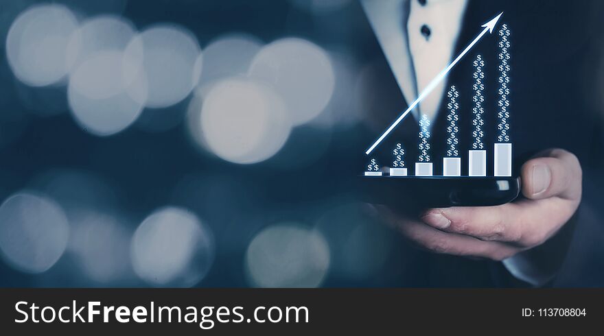 Man holding financial graph. Growth concept