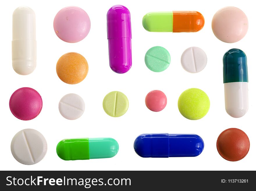 Multicolor pill capsule isolated on white background. Top view. Flat lay. Set or collection.