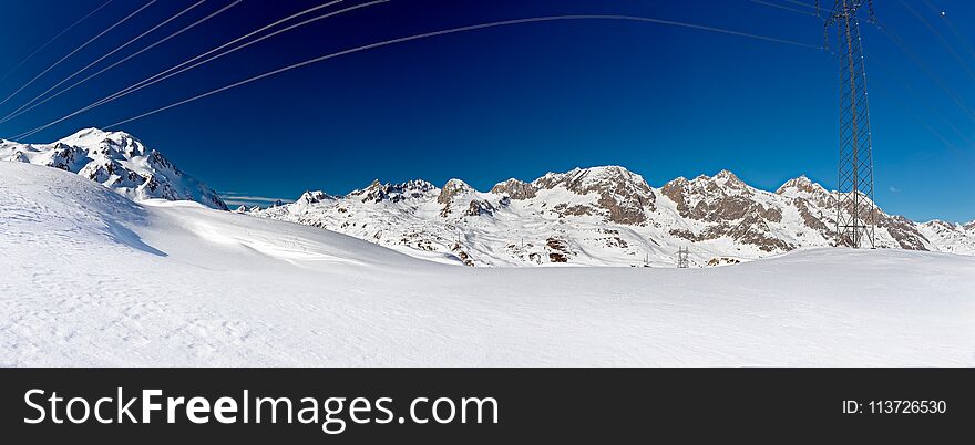 Nufenenpass, the Ticino river springs, in a sunny winter day. Nufenenpass, the Ticino river springs, in a sunny winter day.