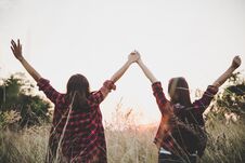 Free Two Friends Enjoying The Summer Sunset. Vintage Filter Style. Stock Photography - 113741112