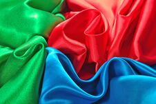 Natural Blue, Red And Green Satin Fabric Texture Royalty Free Stock Image