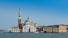 Saint George Church And Its Bell Tower Overlooking The Historic Centre Of Venice, Italy On The Giudecca Canal. Royalty Free Stock Image