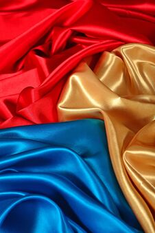 Natural Golden, Blue And Red Satin Fabric Texture Royalty Free Stock Photo