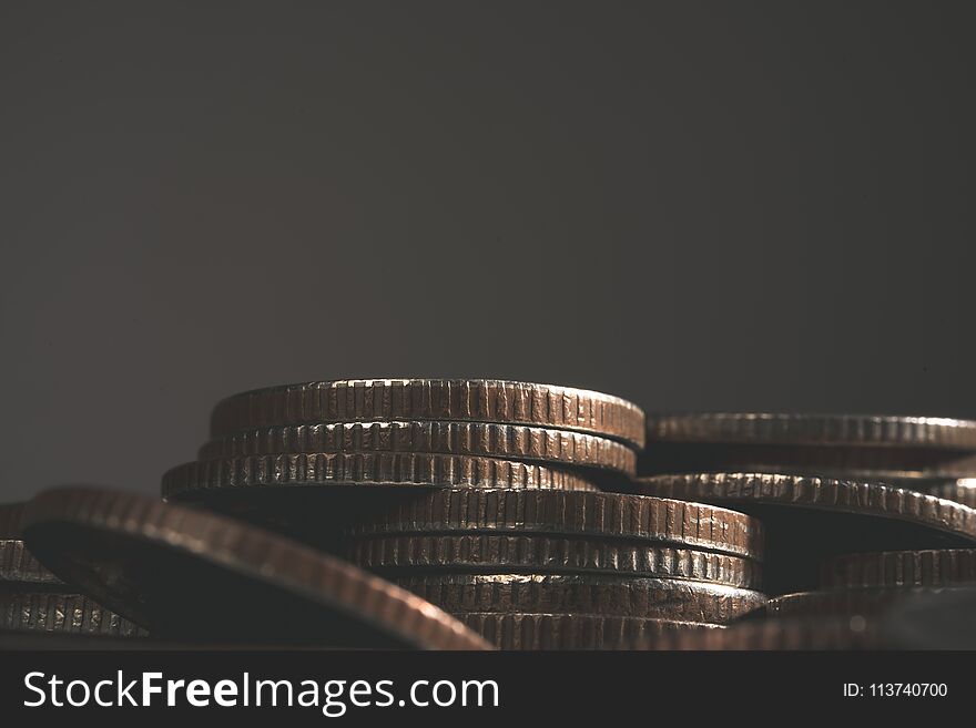 Stacks of coins in the form of a ladder on white backgr