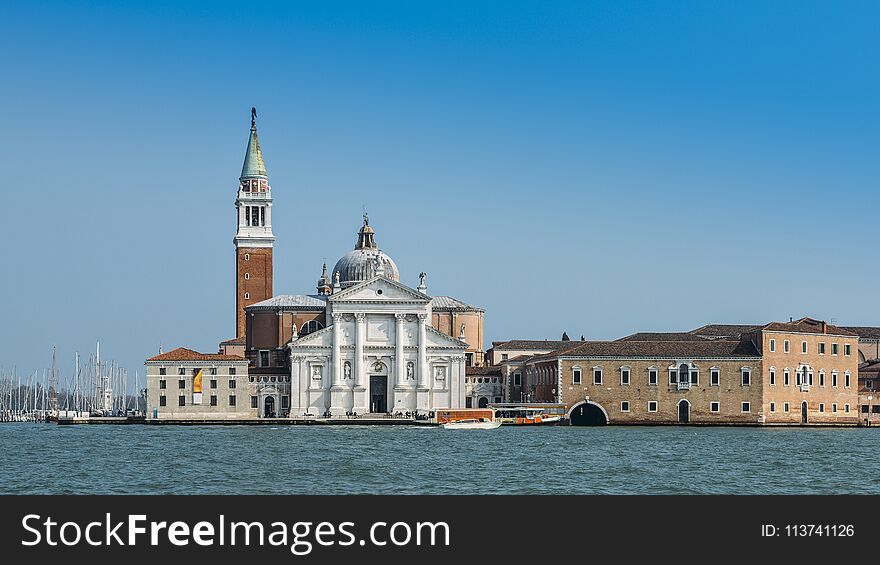 Saint George Church and its bell tower overlooking the historic centre of Venice, Italy on the Giudecca Canal.