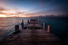 Wooden Pier On The Sea During Sunset. Beautiful Orange Purple Sk Stock Photography Wooden Pier On The Sea During Sunset. Beautiful Orange Purple Sk Stock Photography