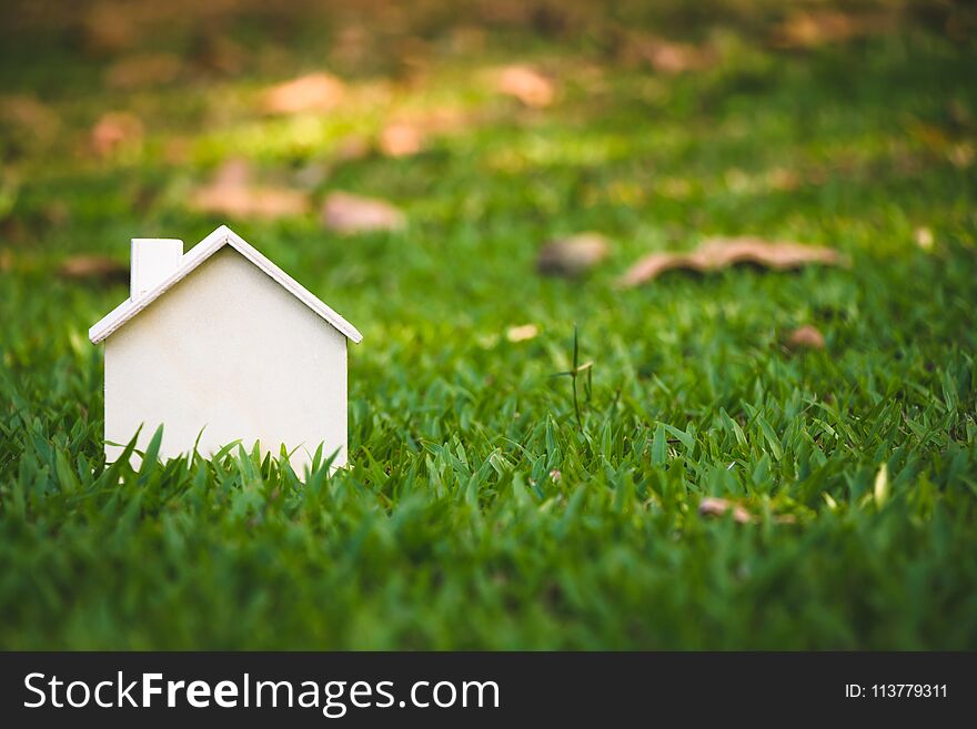 House on the grass in nature, Concept Investment in real estate finance. House on the grass in nature, Concept Investment in real estate finance.