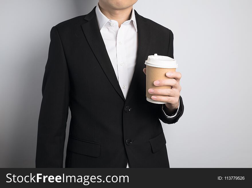 Man holding a paper cup