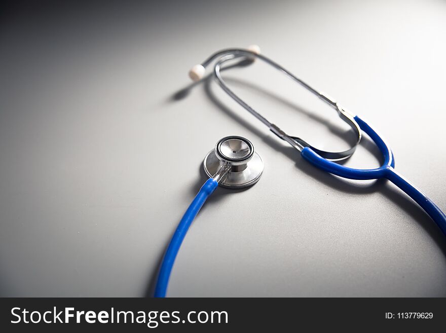 Blue color stethoscope on the table