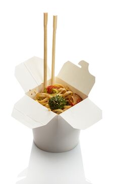 Spicy Noodles With Meat And Vegetables In Wok Box, Chopsticks Isolated On White Stock Photos