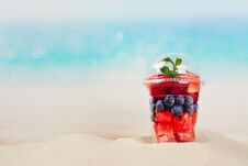 Plastic Cup Full Of Fresh Cut Fruits And Berries Stock Photos